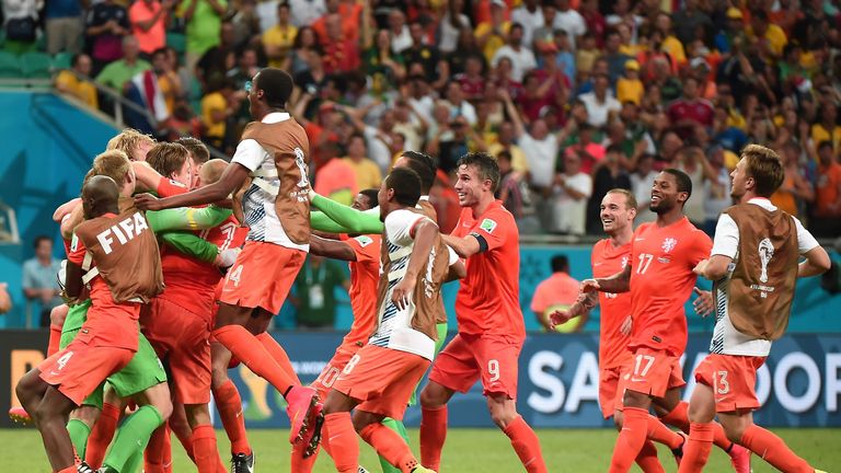Holland players celebrate penalty shootout win v Costa Rica, World Cup quarter-final