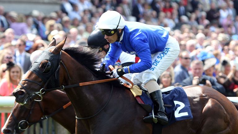 Golden Town ridden by Silvestre De Sousa wins the Spa at Bedford Lodge Hotel mile during the Darley July Cup Day of the July Festival at Newmarket Racecour