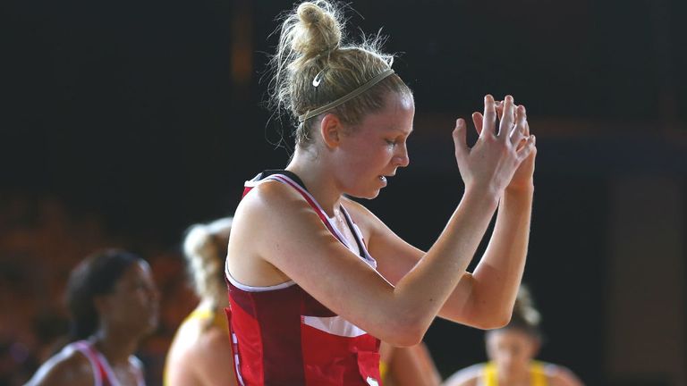 Joanne Harten of England is dejected after England were defeated by Australia during the Pool B netball match