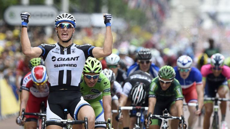 Germany's Marcel Kittel celebrates as he crosses the finish line at the end of the 155 km third stage of the 101st edition of the Tour de France cycling ra