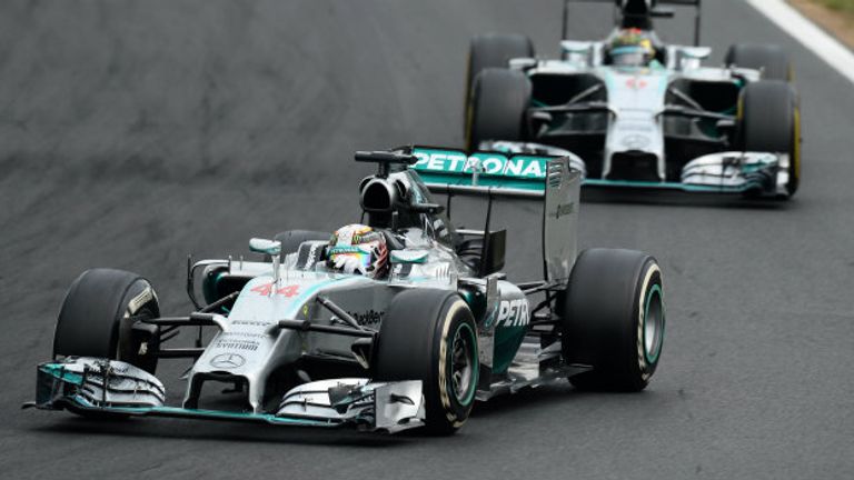 Lewis Hamilton and Nico Rosberg battle in the Hungarian GP