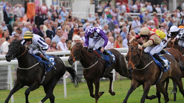 Line of Reason ridden by Paul Mulrennan wins the Acturis Stakes during the Summer Stakes Day of the 2014 John Smith's Cup Meeting at York Racecourse.