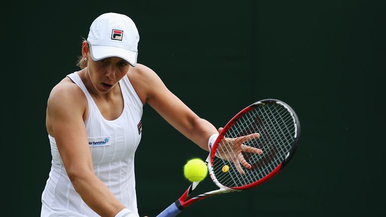 Marina Erakovic plays a backhand during her Wimbledon Ladies' Singles first round match against Ana Konjuh