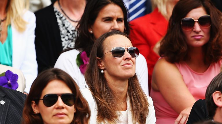 Former champion Martina Hingis pictured among those watching the 2014 women's final