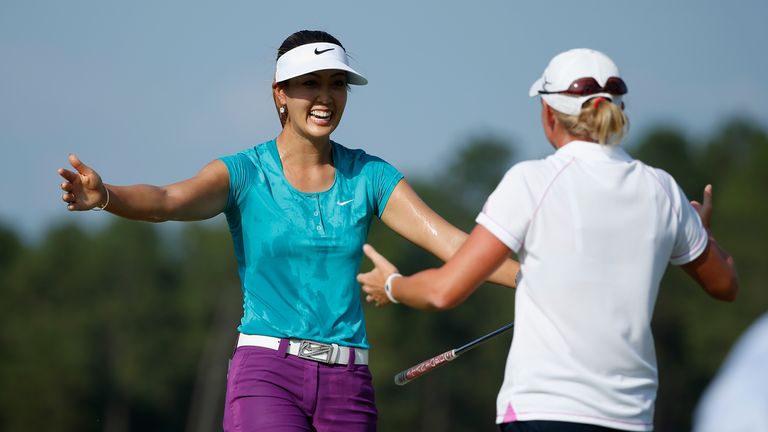 Michelle Wie of the United States greets Stacy Lewis