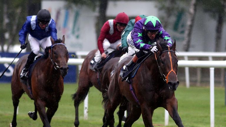 Ivawood (centre) wins the Portland Place Properities July Stakes