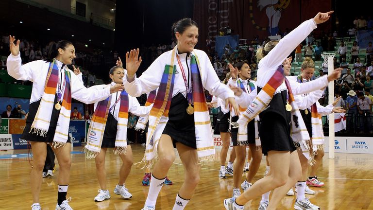 DELHI, INDIA - OCTOBER 14:  Gold medalists New Zealand celebrate after the medal ceremony for the Women Finals Gold medal match between Australia and New Z