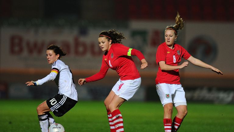 Multi-talented: Nia Jones (centre) plays international netball and football for Wales
