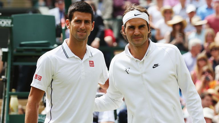 LONDON, ENGLAND - JULY 06:  Novak Djokovic of Serbia and Roger Federer of Switzerland pose together before the Gentlemen's Singles Final match on day thirt