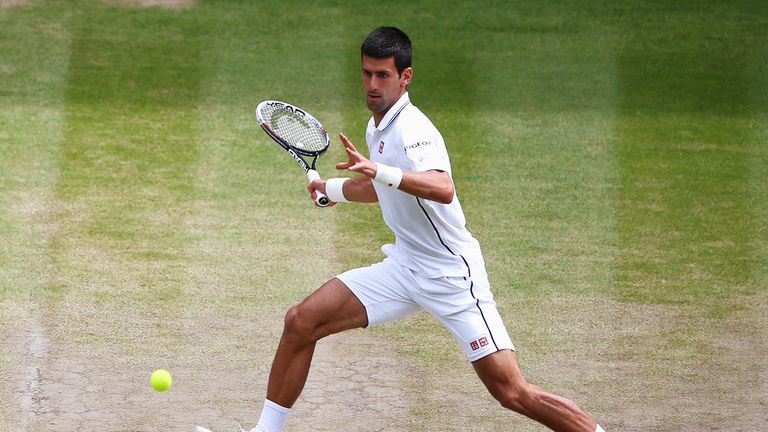 LONDON, ENGLAND - JULY 06:  Novak Djokovic of Serbia plays a forehand return during the Gentlemen's Singles Final match against Roger Federer of Switzerlan