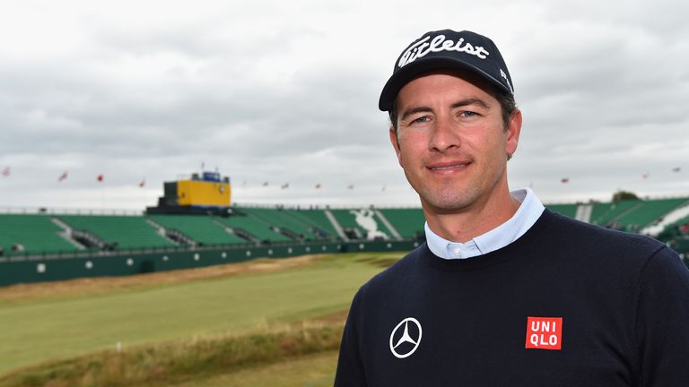 Adam Scott of Australia poses for a portrait in front of the 18th hole during a practice round prior to the start of the 143rd