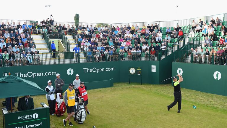 David Howell of England hits the opening shot of the first round of The 143rd Open Championship at Royal Liverpool