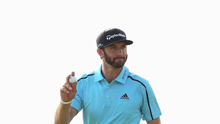 Dustin Johnson of the United States waves to the crowd during the second round of The 143rd Open Championship at Royal Liverpool