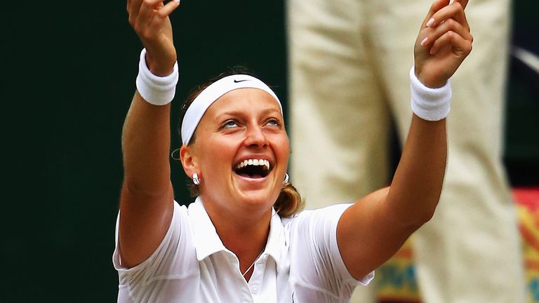 LONDON, ENGLAND - JULY 05:  Petra Kvitova of Czech Republic falls to the floor as she celebrates championship point and winning the Ladies' Singles final m