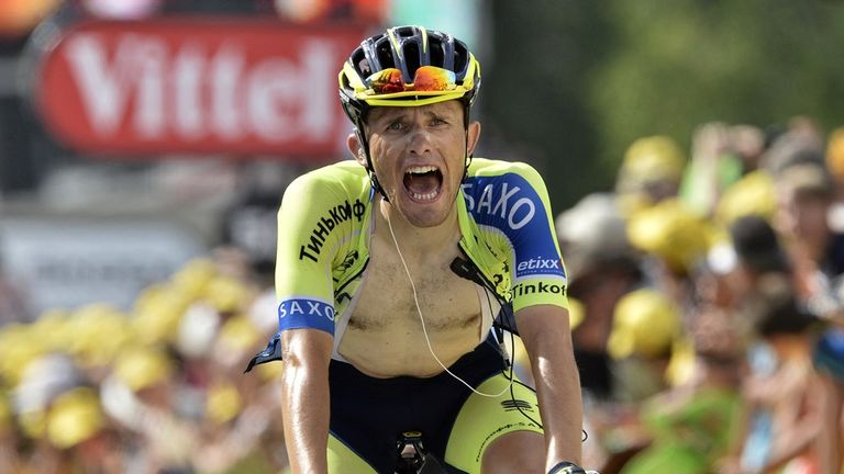 Poland's Rafal Majka celebrates as he crosses the finish line at the end of the 177 km fourteenth stage of the 101st edition of the Tour de France
