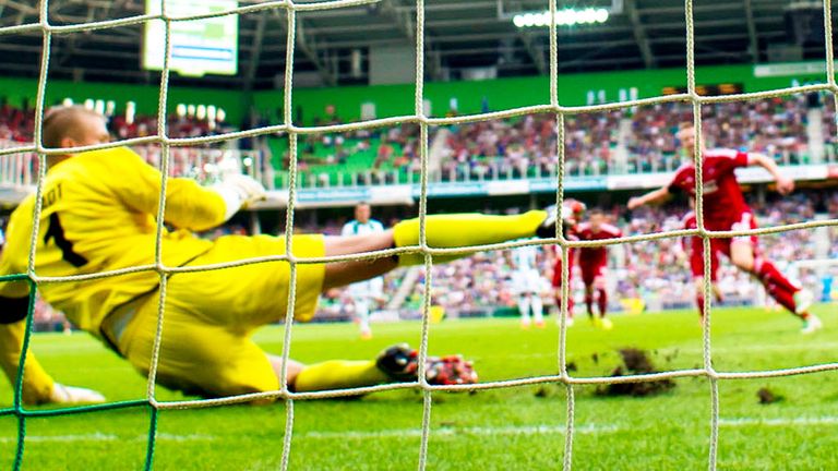 Adam Rooney gives Aberdeen the lead from the penalty spot in Groningen