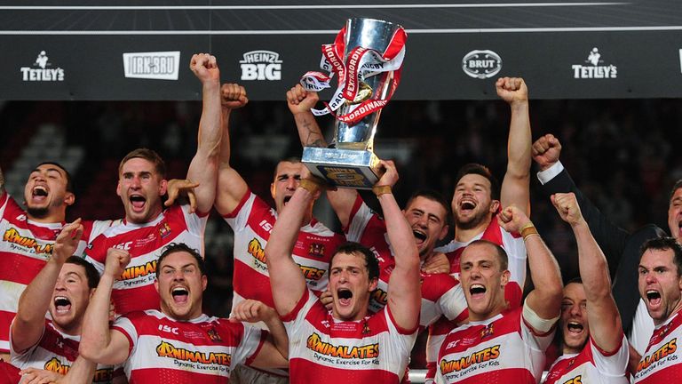Wigan Warriors' celebrate with the trophy after winning the Super League Grand Final.