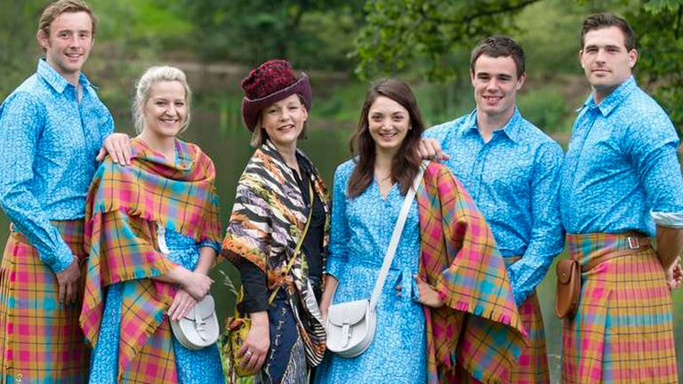 Scottish athletes sport the controversial uniform - designer Jilli Blackwood is third from the left