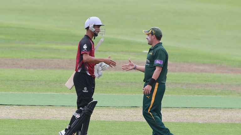 Tim Groenewald of Somerset shakes hands with Steven Mullaney of Nottinghamshire after a tied game at Trent Bridge