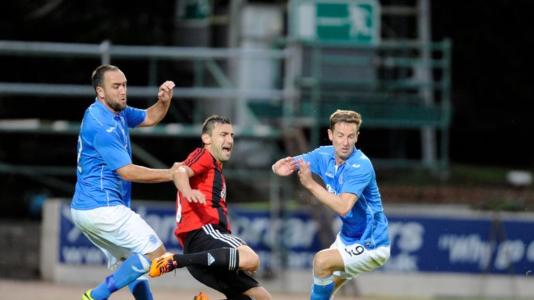 St Johnstone's Lee Croft and Steven Maclean tussle with FC Spartak Trnava's Martin Toth during the UEFA Europa League qualifier