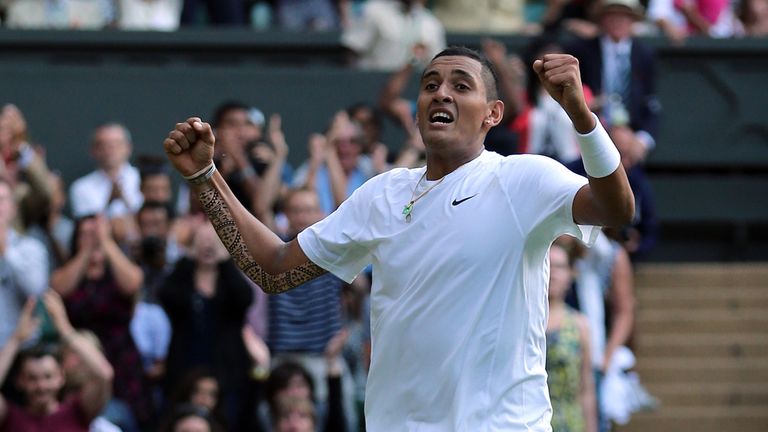 Australia's Nick Kyrgios celebrates defeating Spain's Rafael Nadal during day nine of the Wimbledon Championships at the All England Club