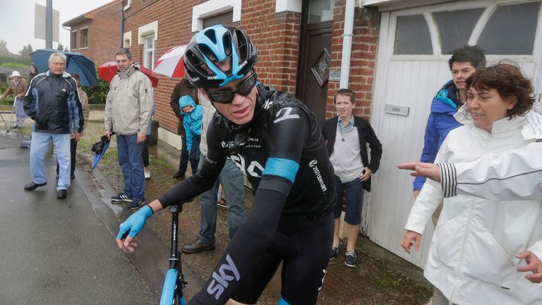 Britain's Christopher Froome gets up after a third consecutive crash in two days prior to abandoning the race during the fifth stage of the Tour de France
