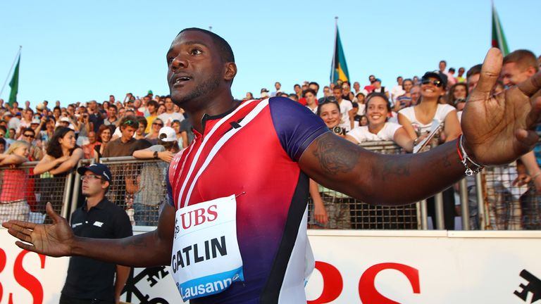 Justin Gatlin celebrates after winning the 100m race at the Diamond League meeting in Lausanne
