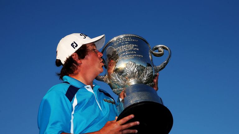 ROCHESTER, NY - AUGUST 11:  Jason Dufner of the United States kisses the Wanamaker Trophy after his two-stroke victory at the 95th PGA Championship at Oak 