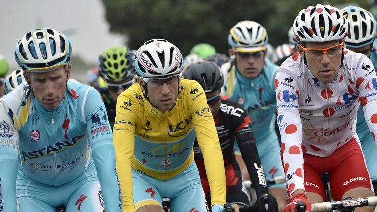 (From L) Netherlands' Lieuwe Westra, Italy's Vincenzo Nibali wearing the overall leader's yellow jersey and France's Cyril Lemoine Tour de France