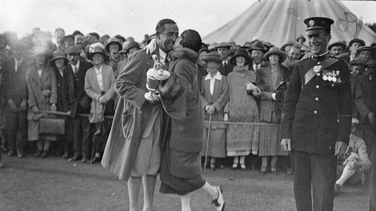 Walter Hagen being congratulated by his wife at Hoylake