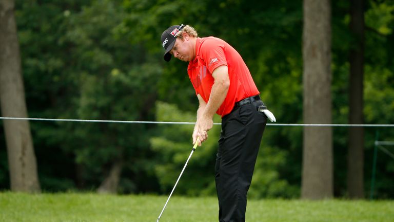 William McGirt attempts his par putt on the ninth green during the second round of the John Deere Classic