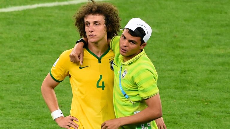 BELO HORIZONTE, BRAZIL - JULY 08:  Thiago Silva of Brazil consoles David Luiz after Germany's 7-1 victory during the 2014 FIFA World Cup Brazil Semi Final 