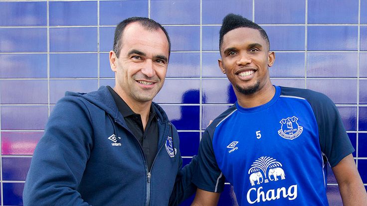 Everton's new signing Samuel Eto'o with manager Roberto Martinez following a press conference at Finch Farm