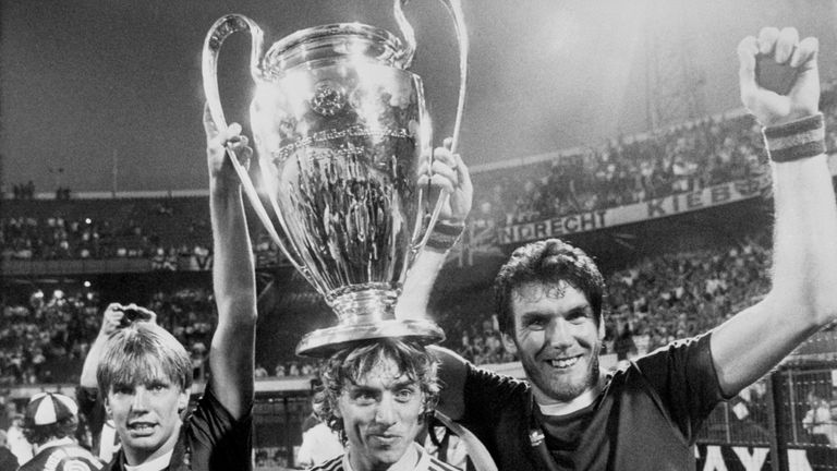 Aston Villa's Gary Shaw (left), Tony Morley (centre) and scorer of the winning goal Peter Withe (right) proudly show off the European Cup to fans in 1982