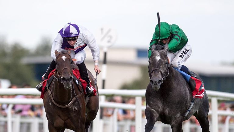 Breton Rock ridden by Martin Lane (left) beats Gregorian ridden by William Buick in the Betfred Hungerford Stakes during the Betfred Ladies Day at Newbury.