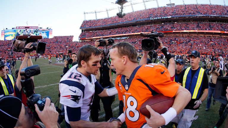 Tom Brady #12 of the New England Patriots congratulates  Peyton Manning #18 of the Denver Broncos