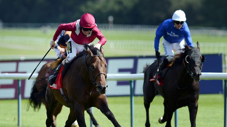 Amralah and Joe Fanning (centre) win the Betfred Rose of Lancaster Stakes at Haydock Park