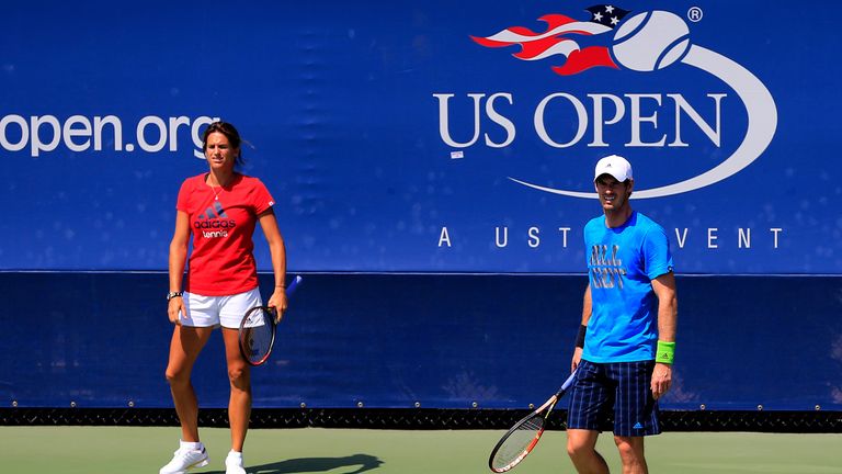Andy Murray practices with his coach, Amelie Mauresmo on Day Three of the 2014 US Open