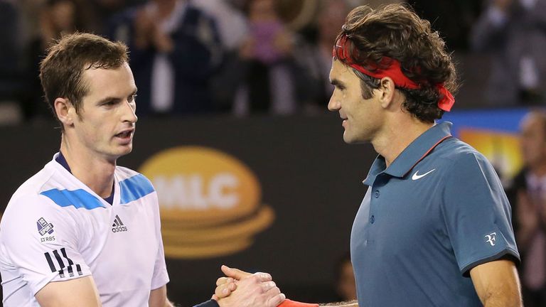 Andy Murray (l) and Roger Federer shake hands after their most recent encounter in Melbourne at the start of 2014  