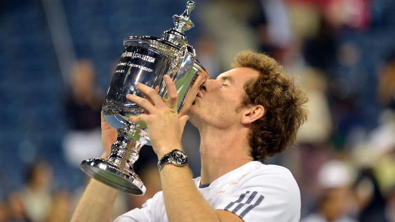 Andy Murray kisses the trophy after his win over Novak Djokovic of Serbia during their men's singles final match at the 2012 US Open tennis tournament