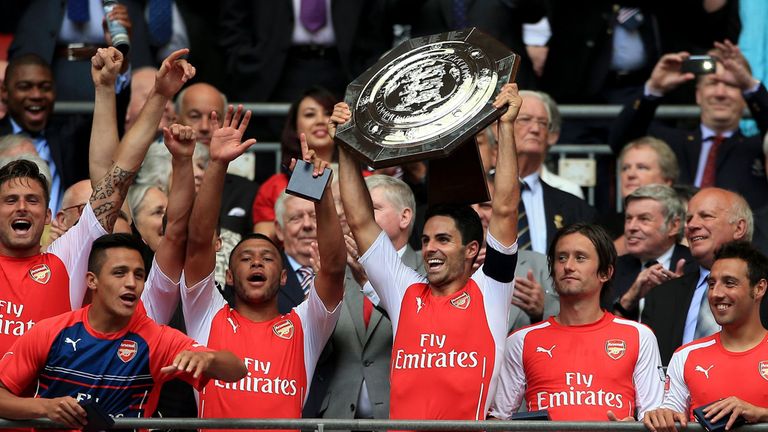 Arsenal captain Mikel Arteta lifts the Community Shield