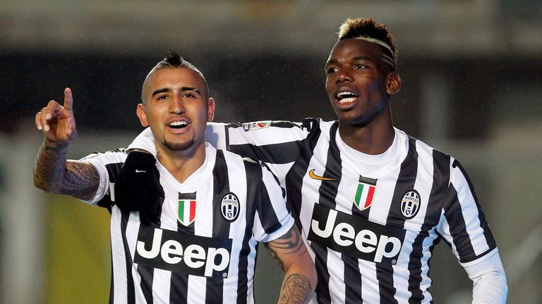 Arturo Vidal (L) and Paul Pogba of Juventus celebrate the 4th goal during the Serie A match between Atalanta BC and Juventus