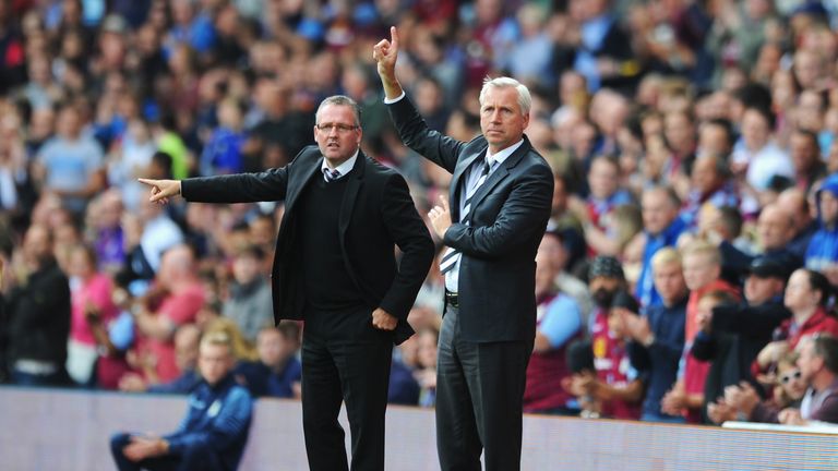 The two managers, Paul Lambert and Alan Pardew, watch on at Villa Park