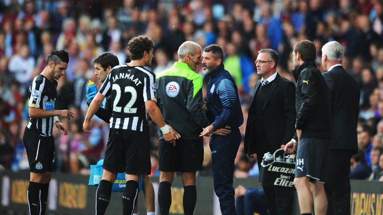 Aston Villa assistant Roy Keane has a word or two with Newcastle's Daryl Janmaat