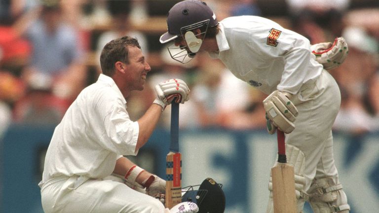 Atherton shares a lighter moment with Jack Russell