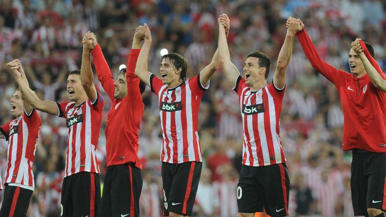Athletic Bilbao's players celebrate after winning the UEFA Champions League play-off second leg football match Athletic Bilbao vs SSC Napoli