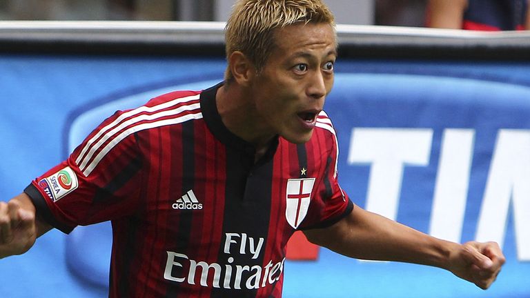 MILAN, ITALY - AUGUST 31:  Keisuke Honda of AC Milan celebrates after scoring the opening goal during the Serie A match between AC Milan and SS Lazio at St