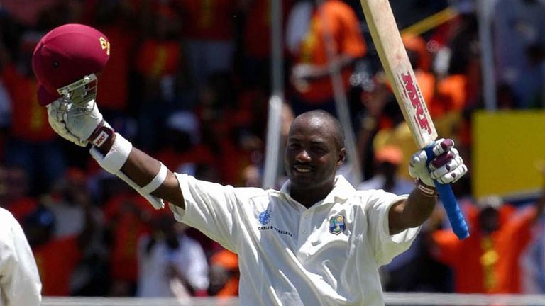 Brian Lara acknowledges the applause as he compiles a world record 400no against England