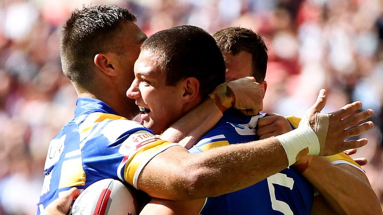 Ryan Hall of Leeds celebrates with team mates after scoring a try during the Tetley's Challenge Cup Final between Leeds Rhinos and Castleford