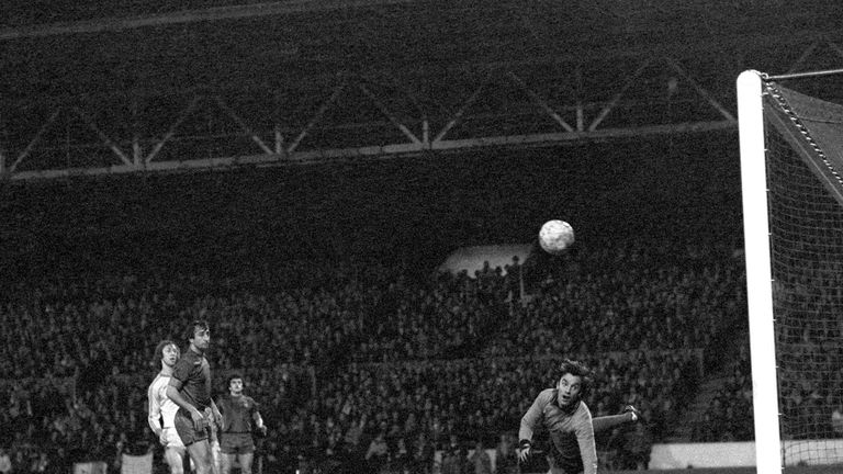 Charlie George (l) scores on his debut for Nottingham Forest against Barcelona in the European Super Cup. Forest won the game 1-0.